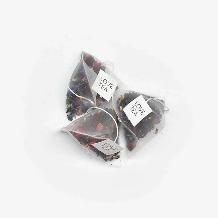 Love Tea Earl Grey Pyramid Tea Bags, blend of Ceylon black tea, floral petals, and bergamot essential oil.