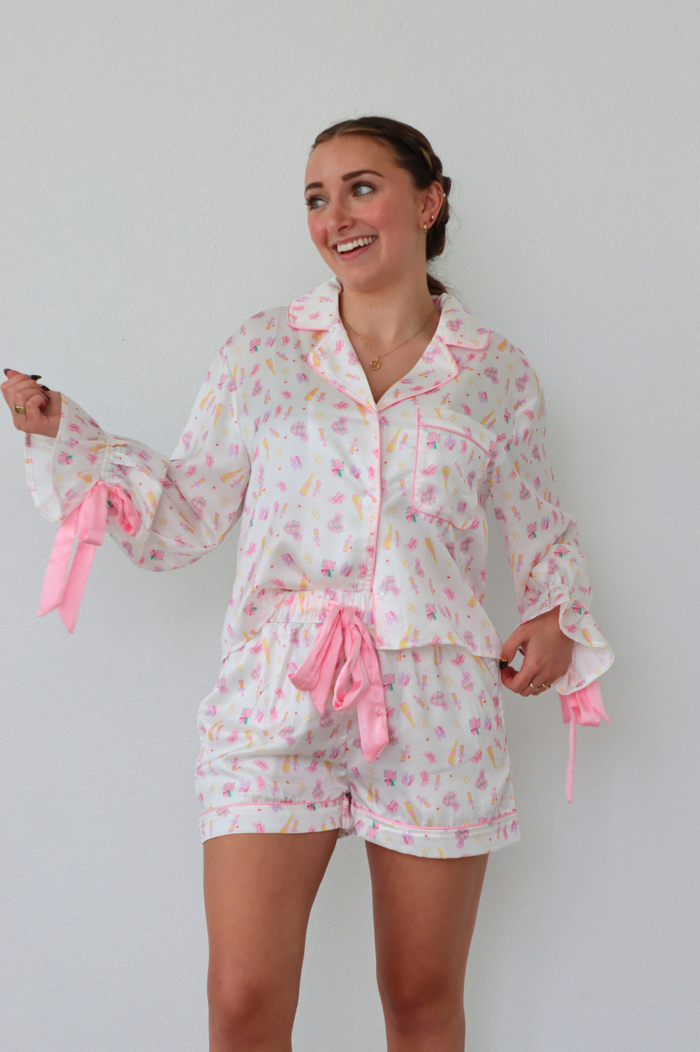girl wearing bridal patterned silk pajama set