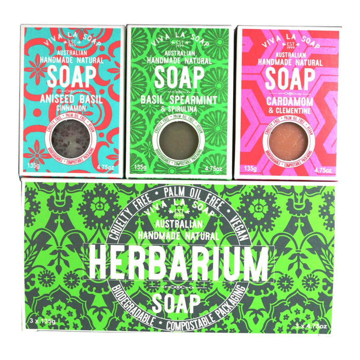3 handmade and natural soaps with exotic, sweet and spicy scents next to its box.