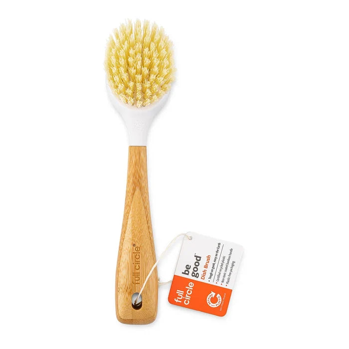 A full circle bamboo-handled dish brush with natural bristles, shown with its product tag on a white background.