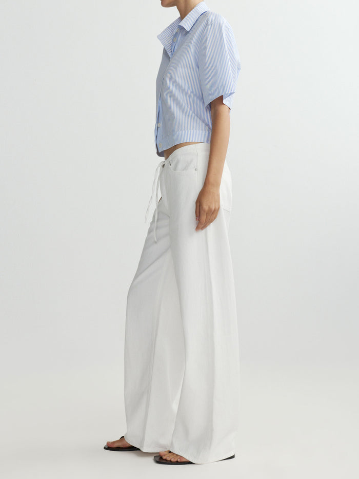 DL1961 women's Carlee Short-Sleeve shirt in blue striped 'Picnic', side view on model.