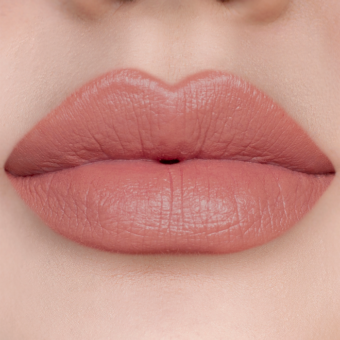 Fiesty rosy nude lipstick on lips, light skin tone