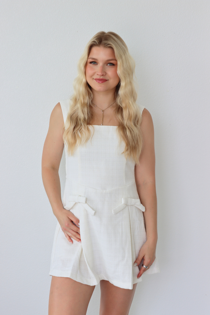 girl wearing white tweed short dress