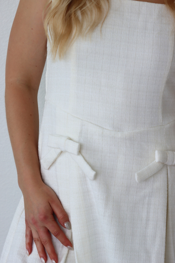 girl wearing white tweed short dress
