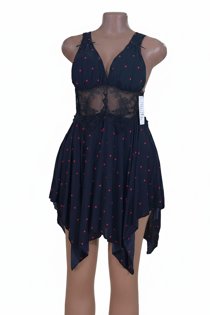 Navy blue polka dot dress on white background