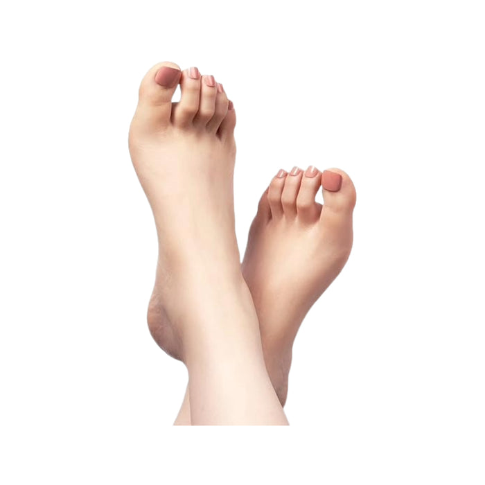 IVY BEAUTY by KISS model feet displaying gold finger solid color toenails soft nude pink pedicure
