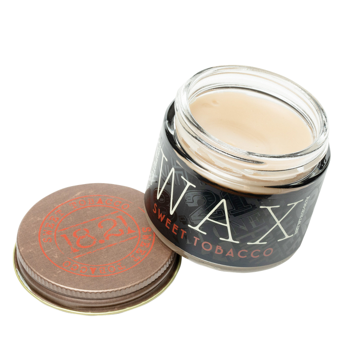 Jar of wax labeled 'Sweet Tobacco' on a white background