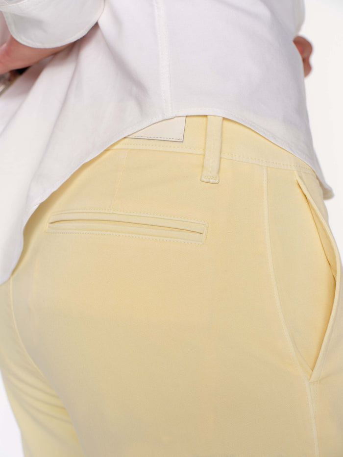 DL1961 men's Jake chino short in pale yellow 'Citron', close-up back detail of welt pocket and belt loop.