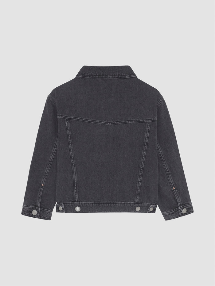 DL1961 girls' Jordyn trucker jacket in washed charcoal 'Nightspell', flat back view with snap-button hem.