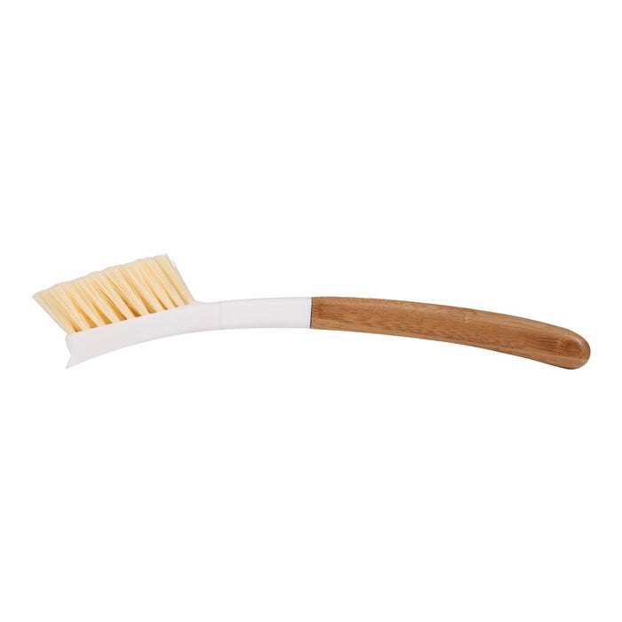 A curved dish brush with a light brown wooden handle, a white plastic neck, and pale yellow bristles, shown against a plain white background. Dishwasher safe.