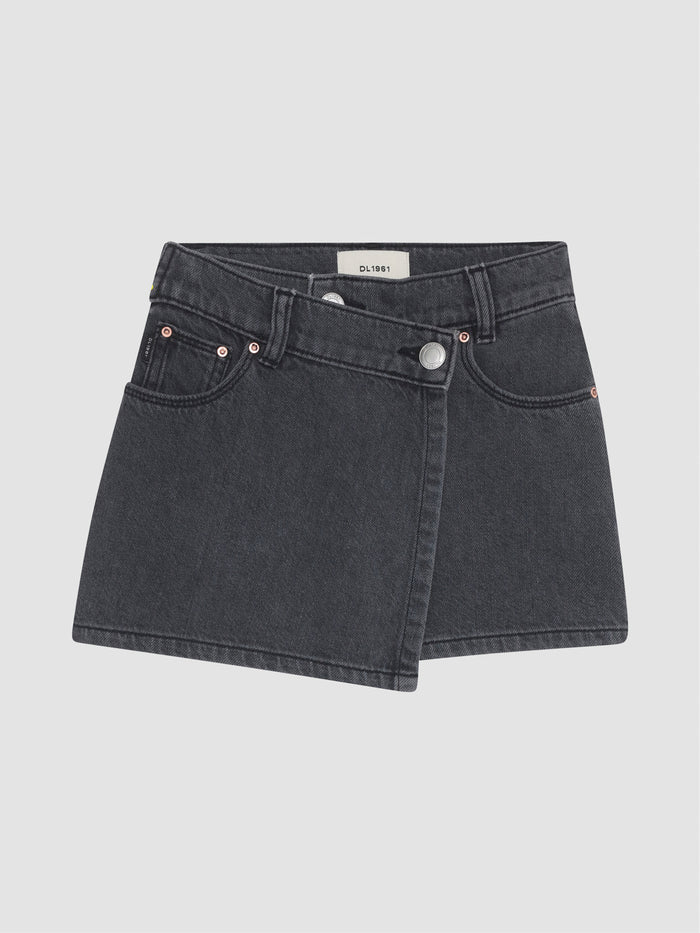 DL1961 girls' Lola skort in washed charcoal 'Nightspell', flat front view with asymmetric wrap panel.