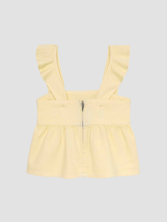 DL1961 girls' Meredyth top in pale yellow 'Sunshine' with ruffle straps and back zip, flat back view.