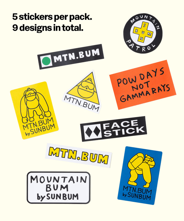 Collection of stickers with various designs including 'Mtn.Bum' and 'Face Stick' on a white background.