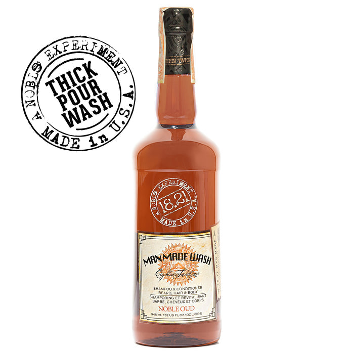 Bottle of Man Made Wash with label and 'Noble Experiment' stamp on a white background