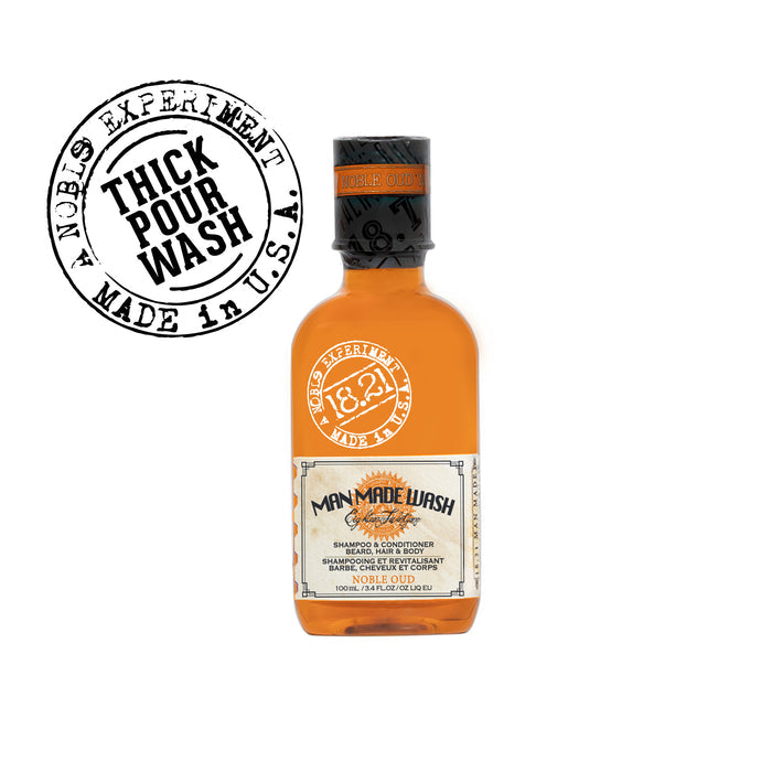 Bottle of 'Man Made Wash' with a label and logo on a white background