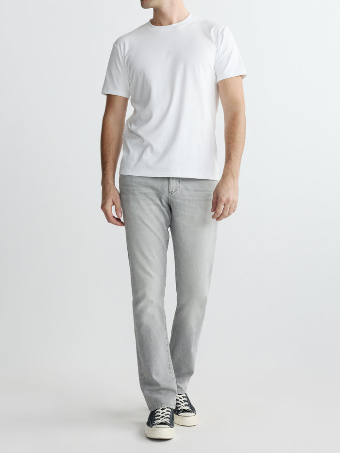 DL1961 men's ribbed crewneck tee in white 'White', full-length front on-model with grey jeans.