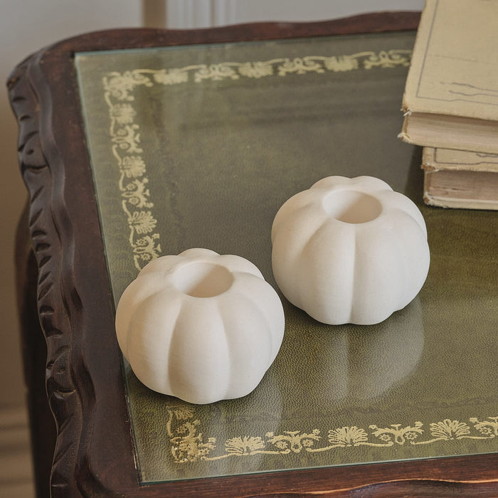 Set of 4 TruGlow® Cream and Dark Green Twisted LED Taper Candles and White Ceramic Pumpkin Taper Candle Holders