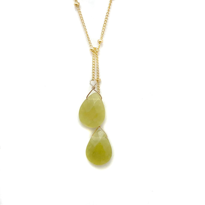Gold-filled lariat necklace with two green teardrop stone drops